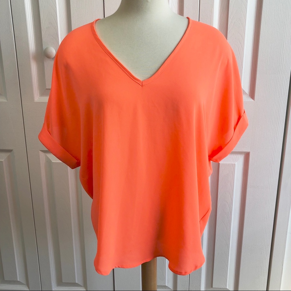 LUSH Oversized Loose Fit top With Shirttail Hem.